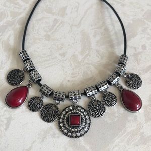 Silver and Red Necklace on Black Cords
